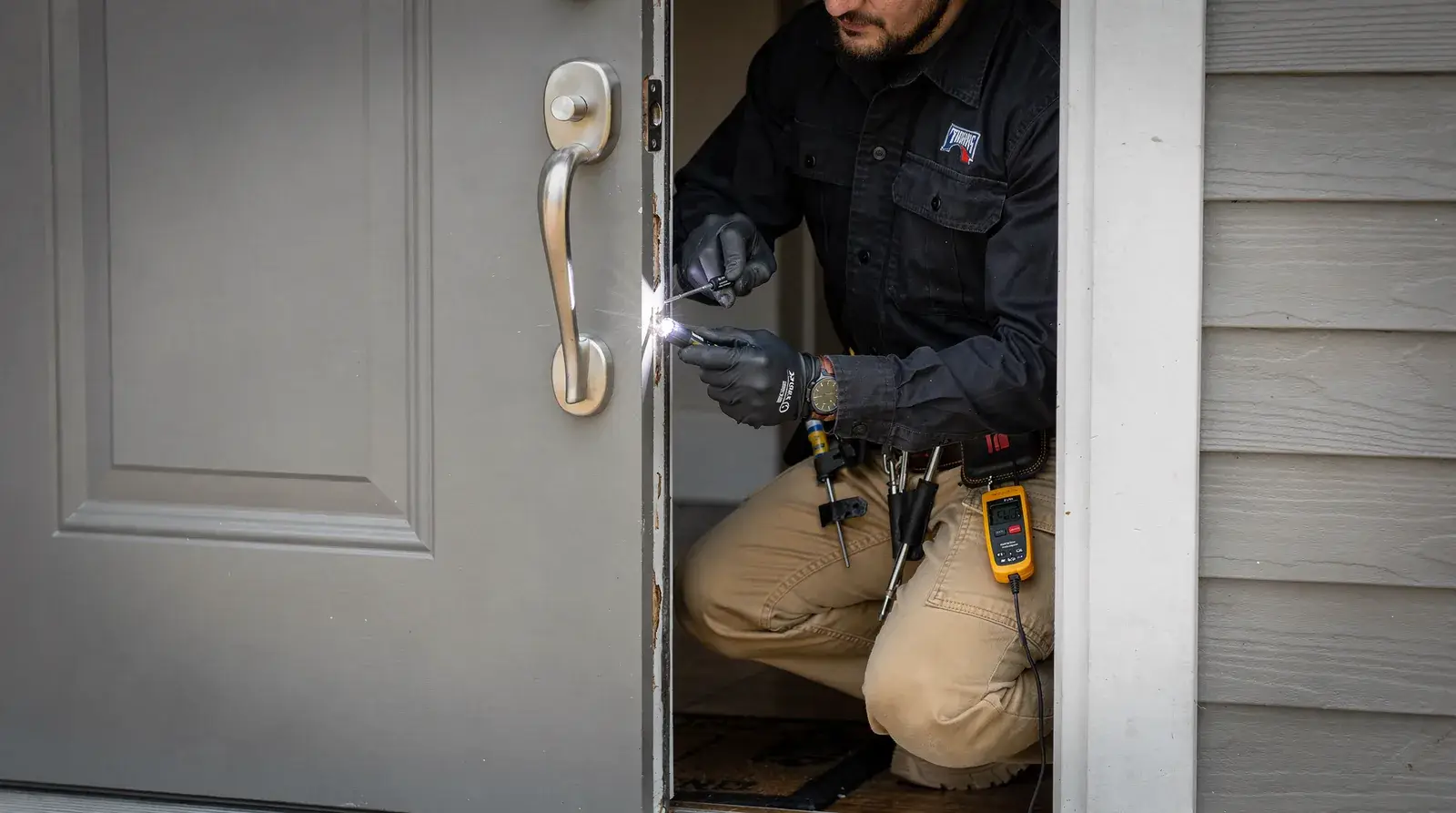 Inspectors rely on flashlights, mirrors, and safety gear along with moisture meters and thermal cameras